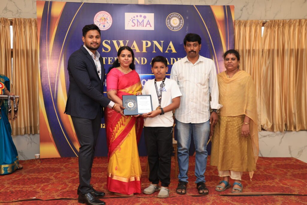 Jaiprasad G. P. Lionize World Records certificate for hitting 10 balls accurately with a cricket bat while blindfolded in 18.51 seconds