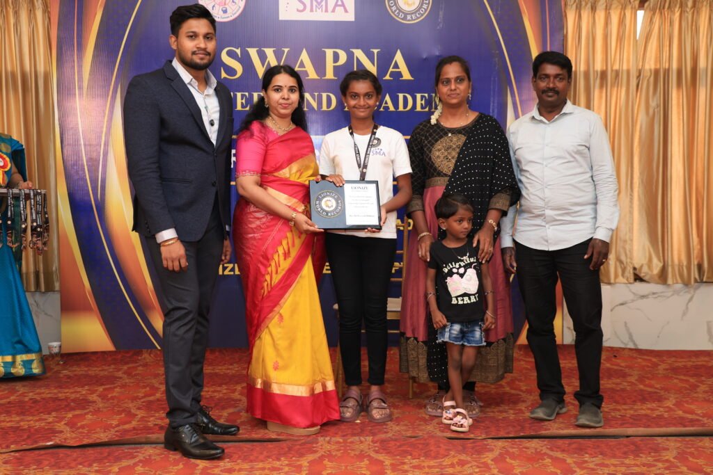 S. N. Vekshana Lionize World Records certificate for identifying 13 obstacles and accurately kicking the ball while blindfolded in 1 minute and 30 seconds