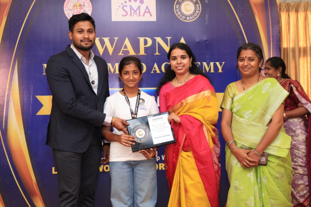 Bavana Prethy S. S. Lionize World Records certificate for identifying 30 UNO cards using her feet while blindfolded in 51.50 seconds